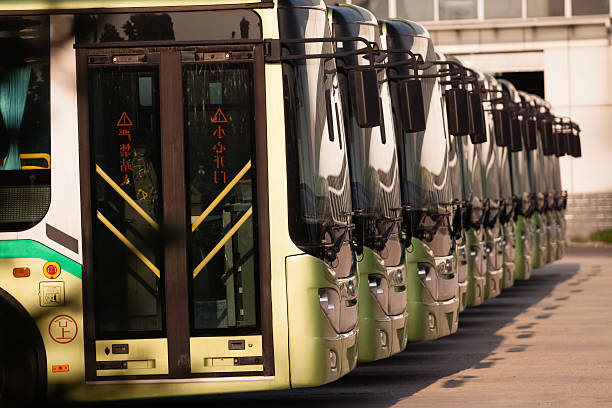 Buses in a row A bus parking, buses in a row,was taken in shenyang,Liaoning province of China.The trademark and copyright text, has been removed from the photo, the rest of the text is the bus warning words. shenyang stock pictures, royalty-free photos & images