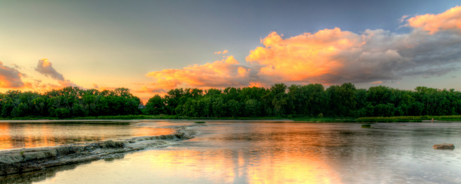 A beautiful warm summer sunset at Weir's Rapids on the Maumee river in northwest Ohio.