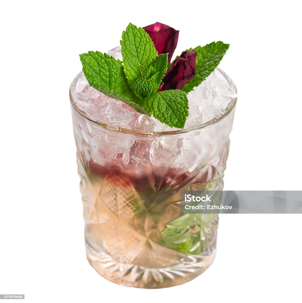 Mint julep cocktail Mint julep cocktail with rose petal isolated on white background 2015 Stock Photo
