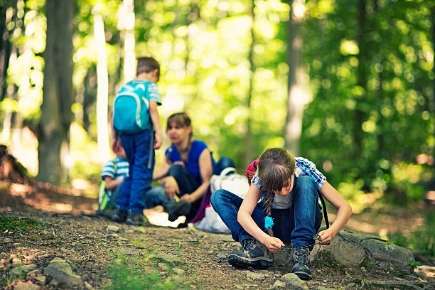 istock Hiker family resting in the forest 477977284
