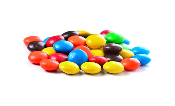 istock Group of colored candys on a white background 477978140