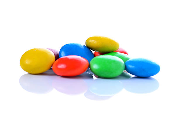 istock Group of colored candys on a white background 477978144