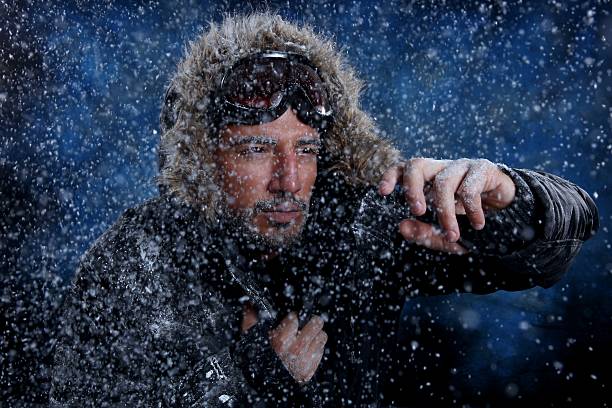 istock Fearful Man Freezing in Cold Weather 477978637