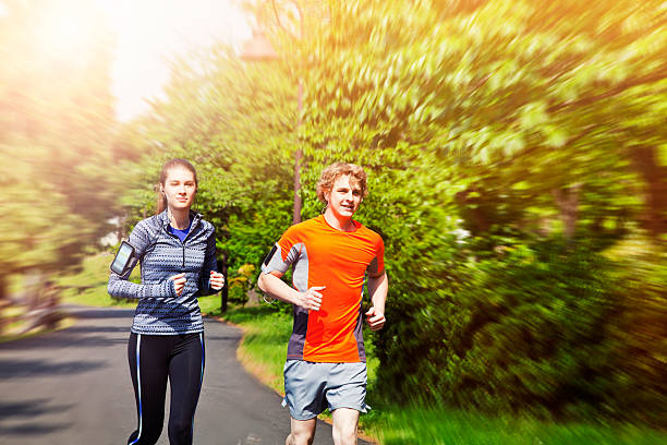 istock Young couple jogging in park, Tokyo. 477981036