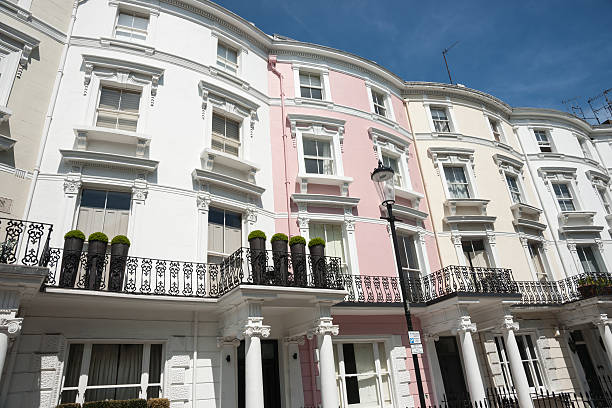 istock White and pastel terrace homes. 477981311