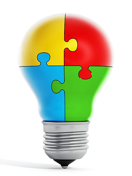 istock Puzzle parts forming a lightbulb 477983942
