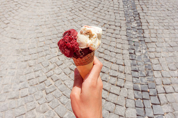 istock Girl holding an ice cream 477984892