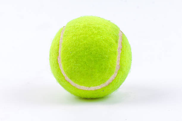 istock Single tennis ball isolated on white background 477984936
