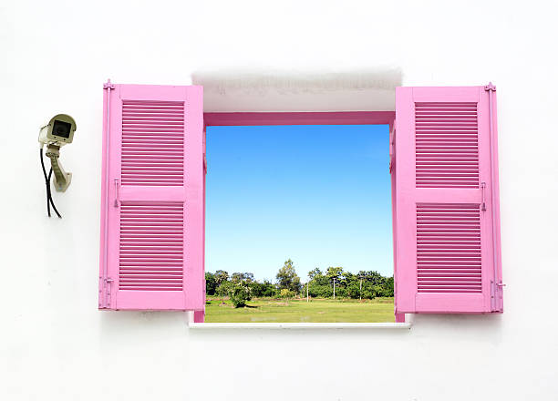 istock Greek style windows with cctv and country field 477985749