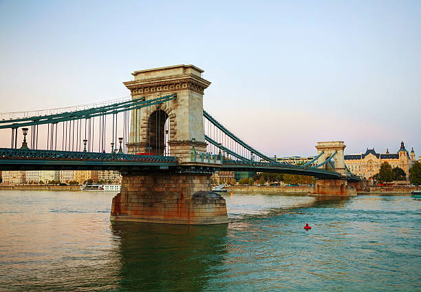 Szechenyi chain bridge in Budapest, Hungary Szechenyi suspension bridge in Budapest, Hungary in the morning time danube river stock pictures, royalty-free photos & images