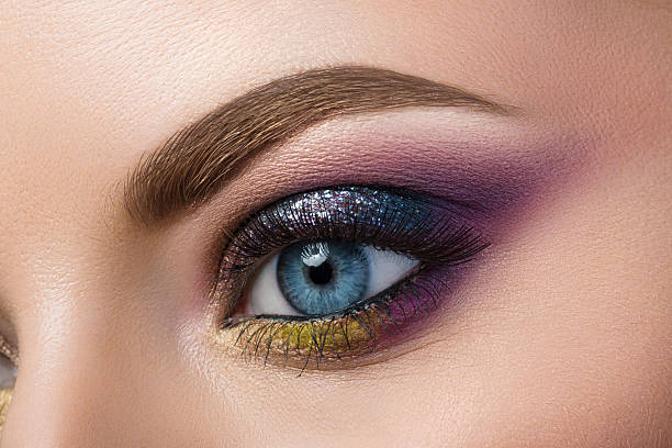 istock Close-up view of blue female eye 477988434