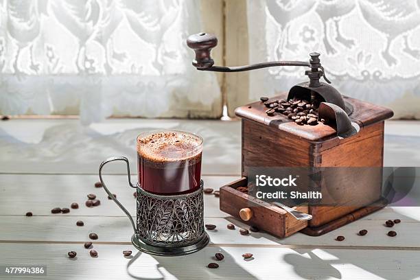 Freshly Roasted Ground Coffee And Old Grinder Stock Photo - Download Image Now - 2015, Antique, Arabia