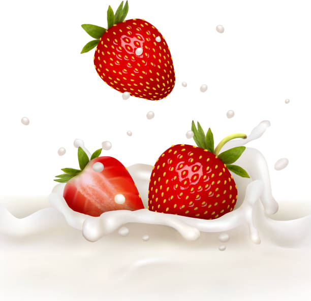 istock Red strawberry fruits falling into the milky splash. 477994411