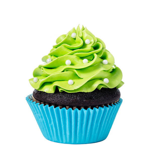 Green Cupcake Chocolate cupcake decorated with green icing and sprinkles isolated on white cupcake photos stock pictures, royalty-free photos & images