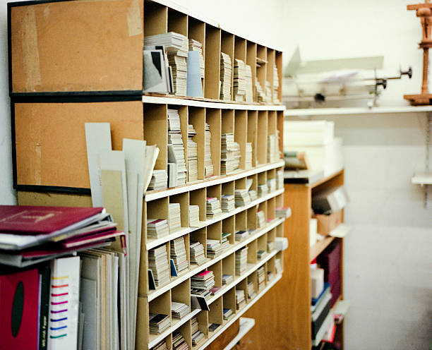 istock shelf full of books and stuff in a workshop 477995105