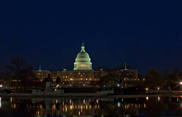 istock The United States Capitol at night 477997617