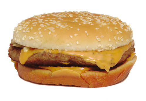 A cheese burger on a white background