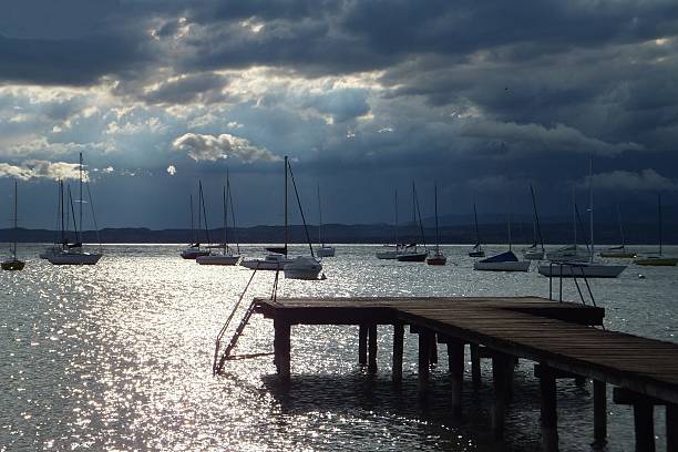 istock Sail boat at lake Garda 477998696