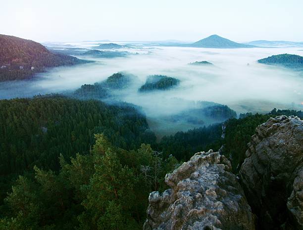 istock Fairy morning sunlight on beautiful sleeping landscape under mist 478000014