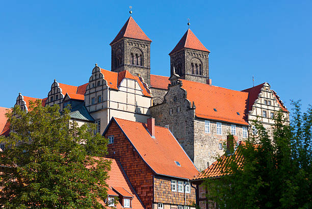 Quedlinburg, Germany - July 5th, 2015: View over The Quedlinburg castle hill complex and Roman Catholic Church of St. Wiperti. 