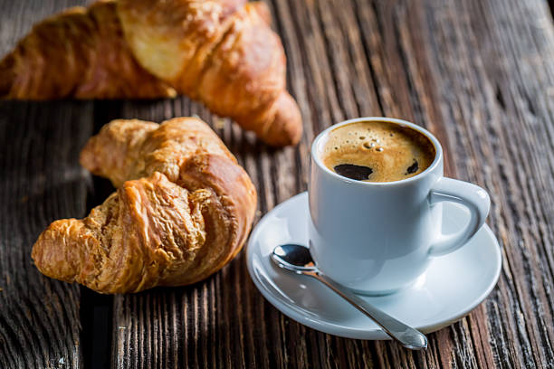 istock Delicious coffee and fresh croissant for breakfast 478007332