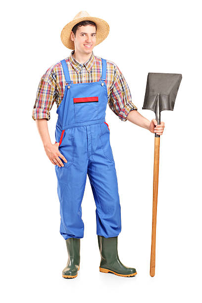 istock Male agricultural worker holding a shovel 478007677