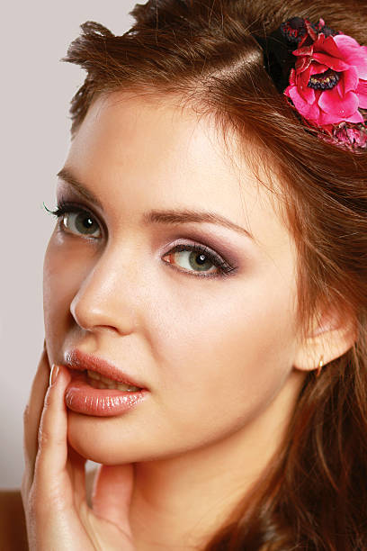 istock Happy woman touching her face 478011841