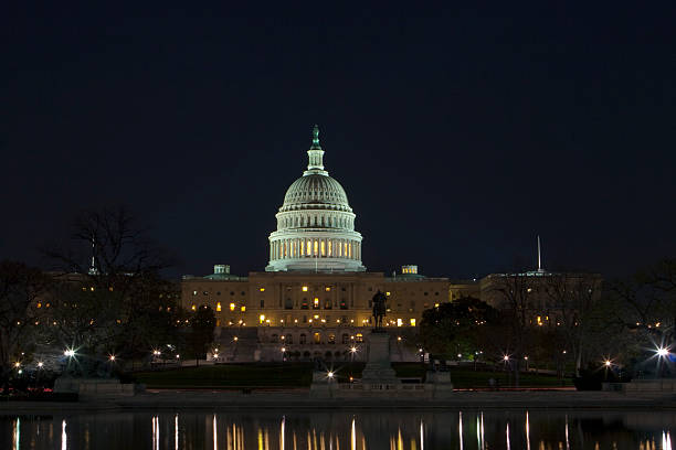 istock The United States Capitol at night 478012719