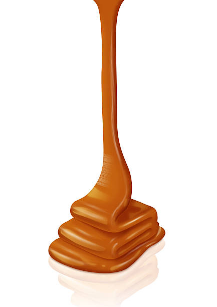 istock Pouring sweet caramel sauce on a white background (clipping path) 478013743