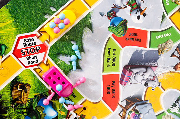 Los Angeles, CA USA - June 18, 2015: Two players have chosen different paths in the popular board game, \