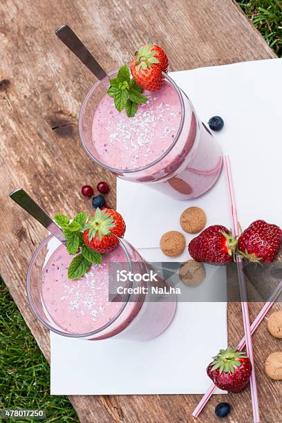 Fruity Berry Milkshake Outdoors Stock Photo - Download Image Now - 2015, Berry Fruit, Biscotti