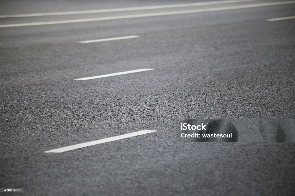 Road Closeup of the road with road marking 2015 Stock Photo