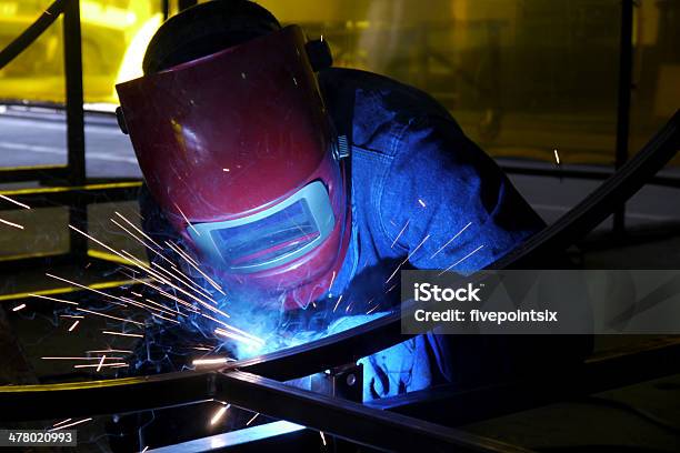 Welding In A Factory Stock Photo - Download Image Now - Burning, Construction Industry, Factory