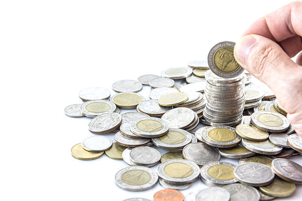 istock Hand put coins to stack of coins 478021692