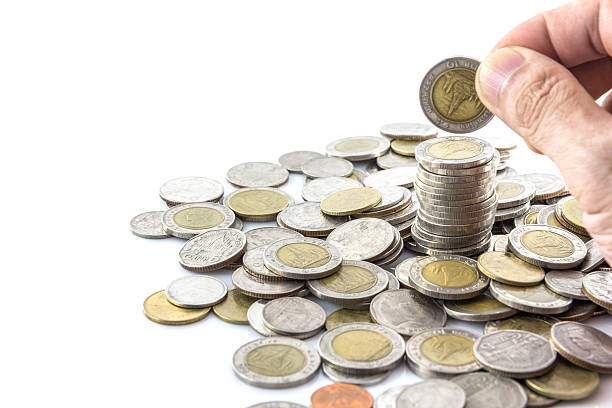 istock Hand put coins to stack of coins 478021708