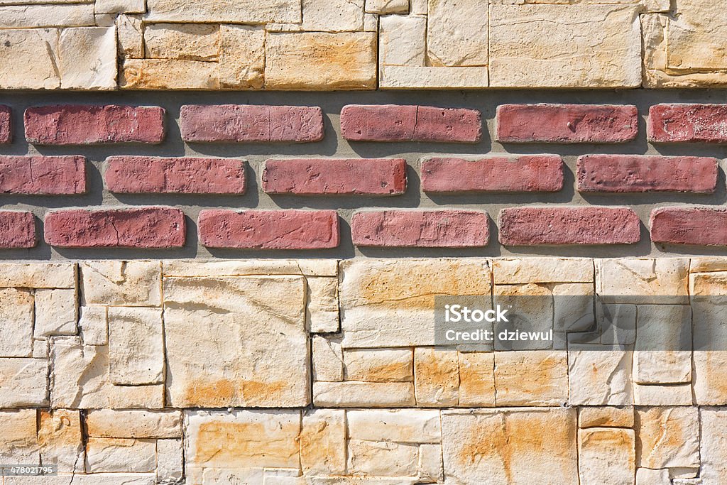 Rosso e giallo sfondo di muro di mattoni - - Foto stock royalty-free di Architettura