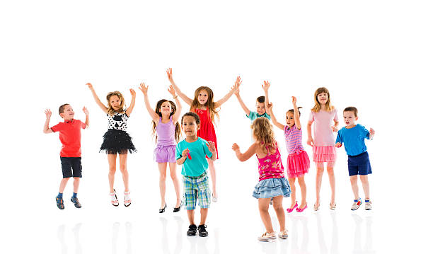 istock Cheerful children jumping and having fun. Isolated on white. 478021942
