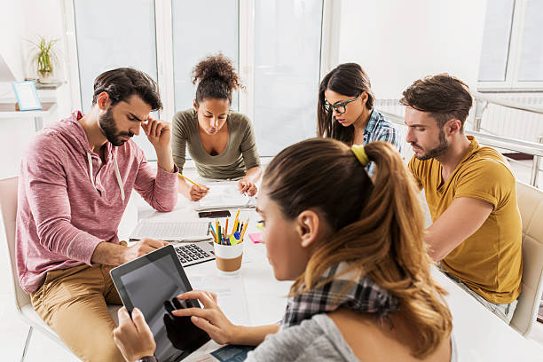 istock Busy creative people working on a meeting in the office. 478021968