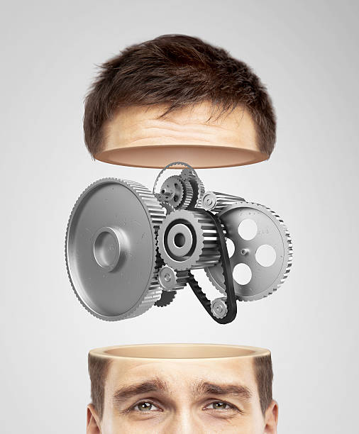 istock half head and metal gears 478023427