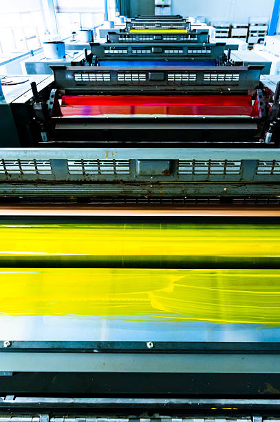 Printing Rollers of a CMYK Industrial 8-Colours Lithograph Printer stock photo