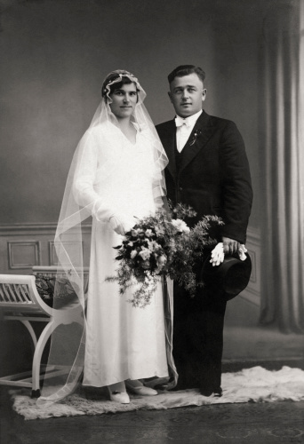 Vintage portrait of a caucasian couple on their wedding day back in 1934.