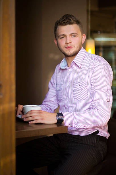 istock Portrait of a young man drinking coffee 478024981