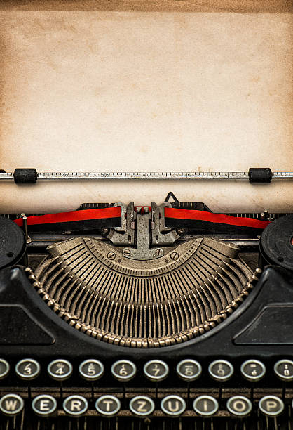 istock Antique typewriter with aged textured paper sheet 478026008