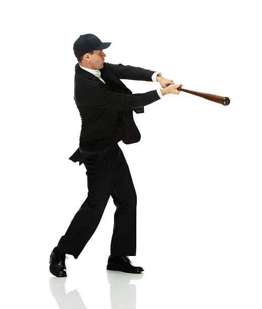 istock Businessman swinging baseball bat 478030611
