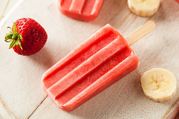 istock Homemade Strawberry and Banana Popsicles 478032538
