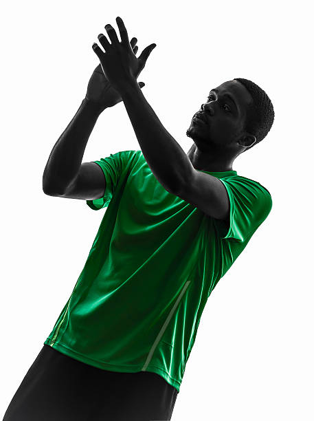 istock african man soccer player applauding silhouette 478034131