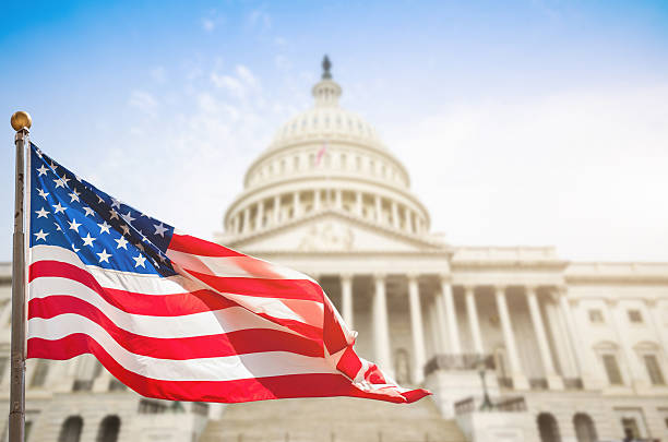 istock washintgton dc with us flag waving 478038889