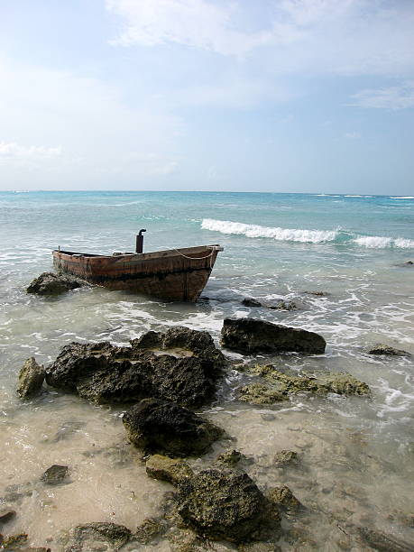 Abandoned Boat in the Caribbean Sea stock photo