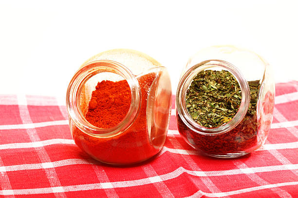 istock jars with spices paprika and lovage isolated 478042977