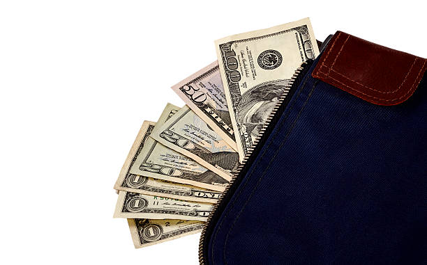 istock US Currency in a Money Bag 478043844